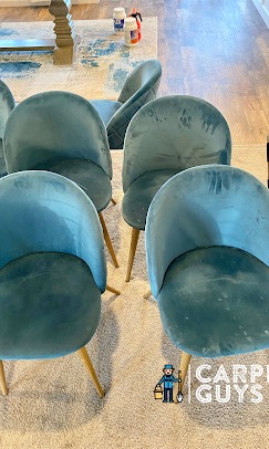 Blue upholstered chairs before cleaning