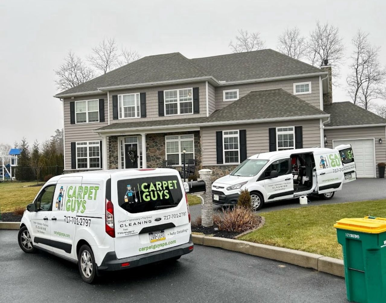 Carpet Guys branded service vans at a Central PA home